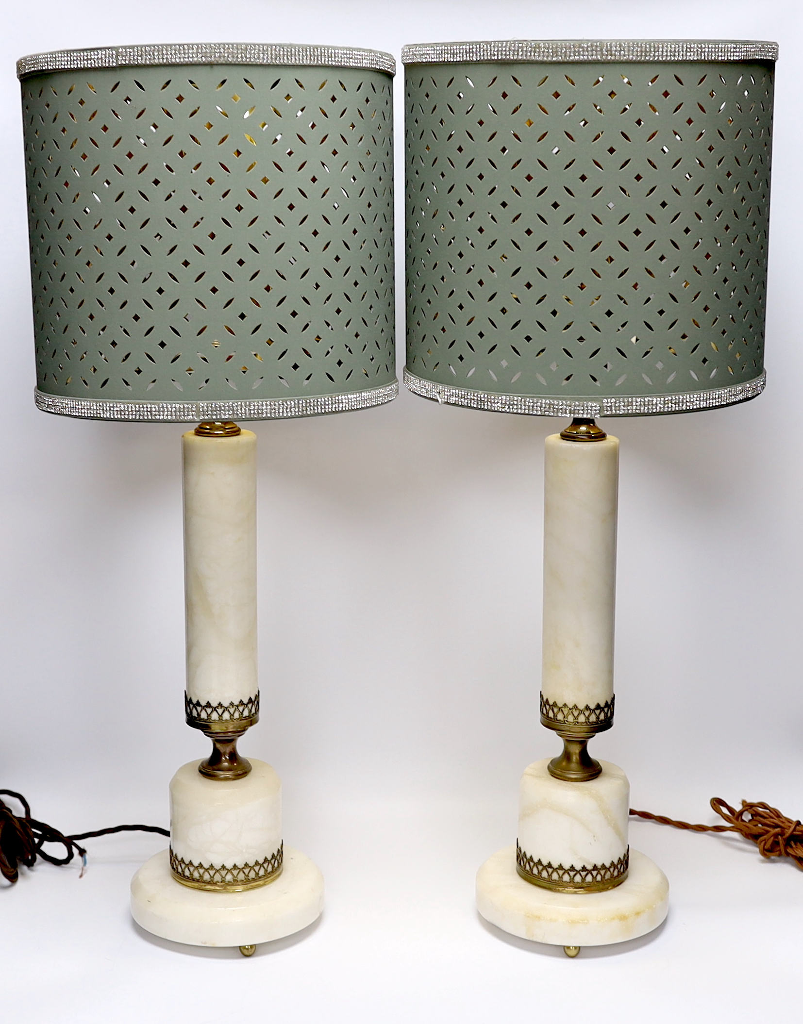 A pair of white marble column table lamps with gilt metal mounts and shades, 61cm high overall